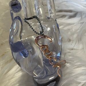 Coach Rose Gold Script puppy tag bag